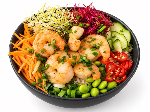 Poke bowl with shrimp, carrots, edamame and cucumber